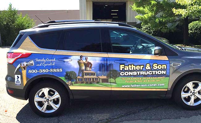 A colorful car wrap for a construction company