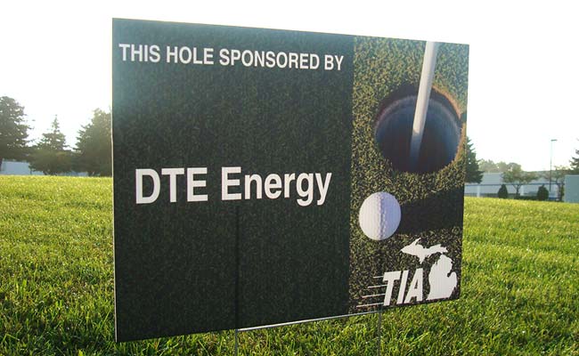 A large banner for a golf outing
