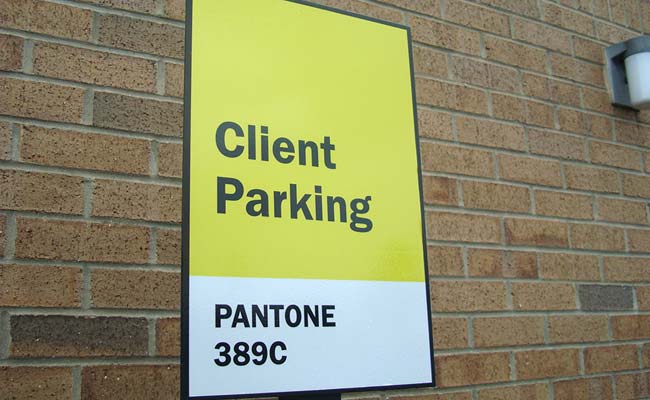 A sign indicating where clients are to park