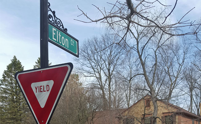 A combination street and traffic sign