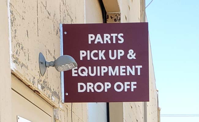 A vinyl blade sign for wayfinding 